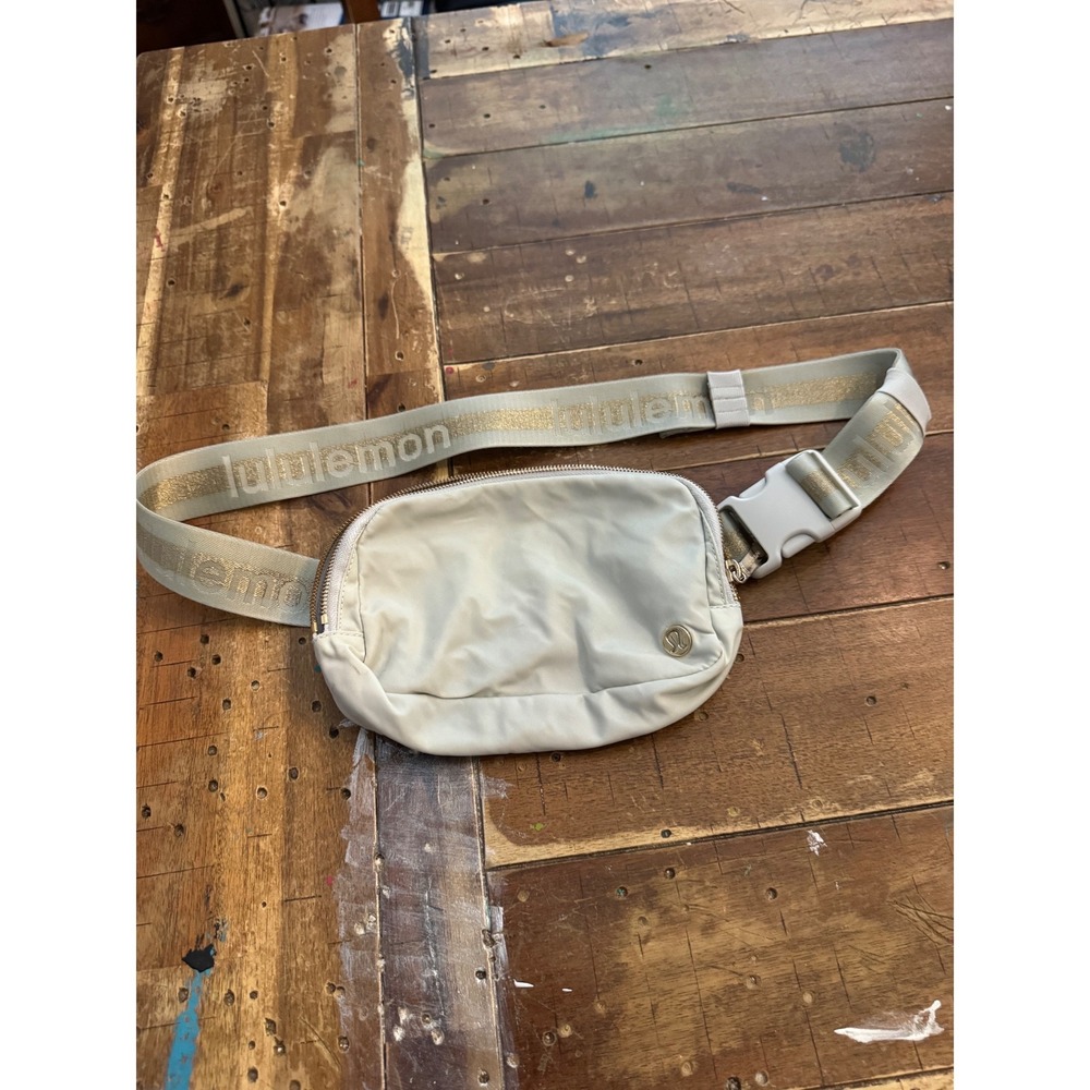Lululemon Everywhere Belt Bag 1L Silver Drop Gold Logo Metallic Strap